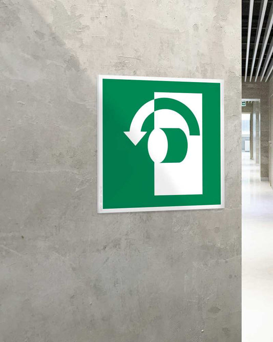 Stickershop - Okrenuti suprotno od kazaljke da se otvori – ISO E018